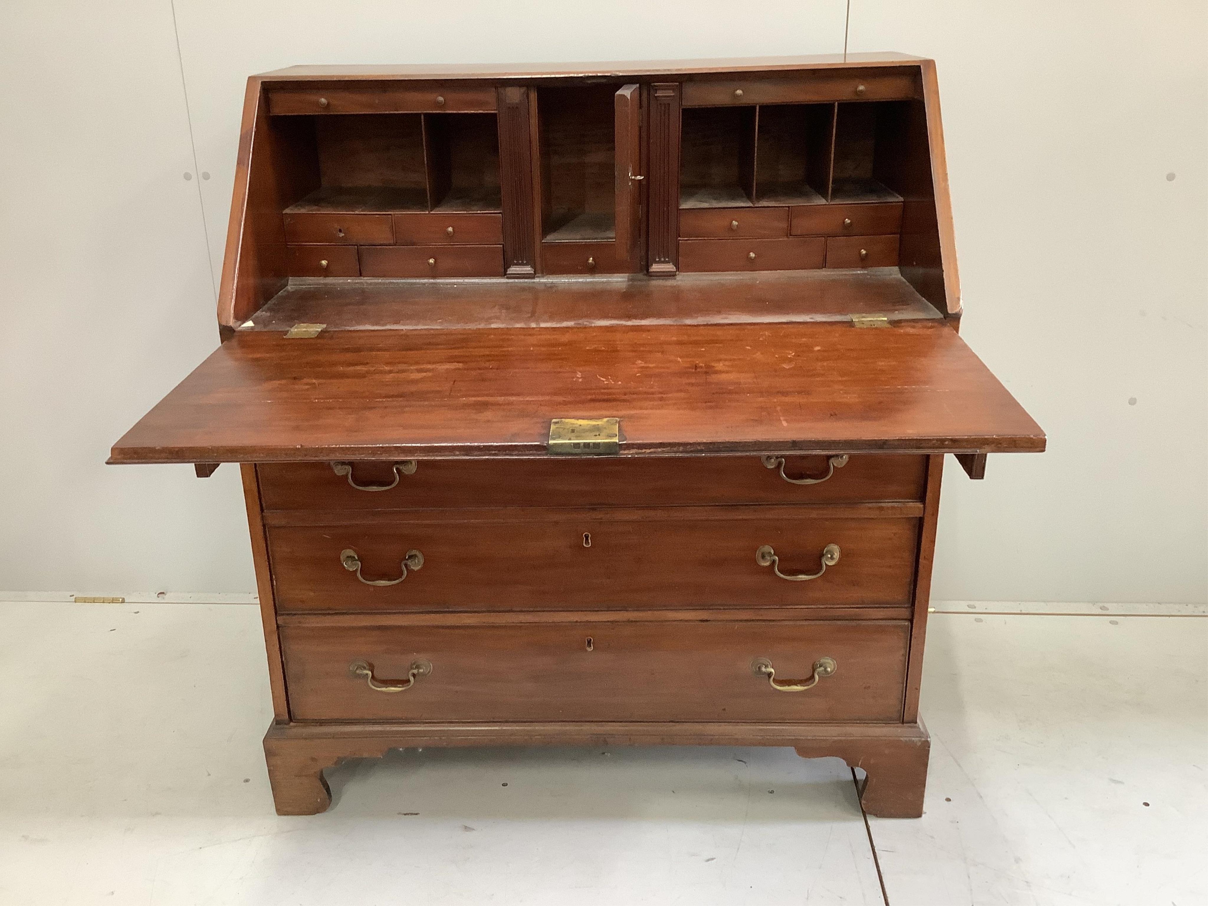 A George III mahogany bureau, width 100cm, depth 54cm, height 112cm. Condition - poor